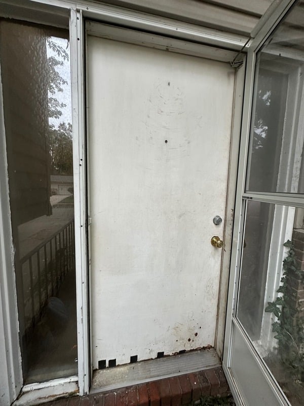 Old door before replacement